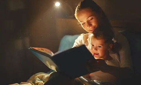 A child enjoying a bedtime story